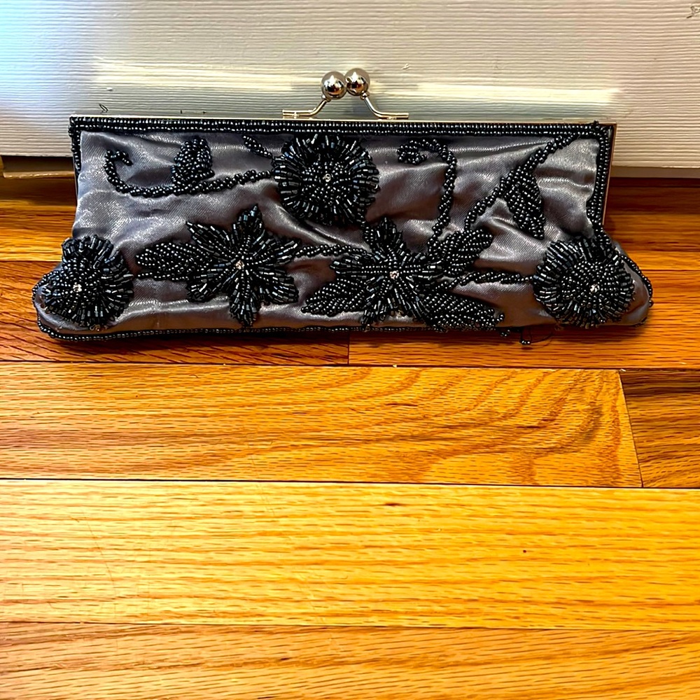 Blue beaded clutch with Beaded handle never been worn.